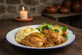 Pollo encebollado con limón served with mashed potatoes and fresh salad, traditional Colombian style